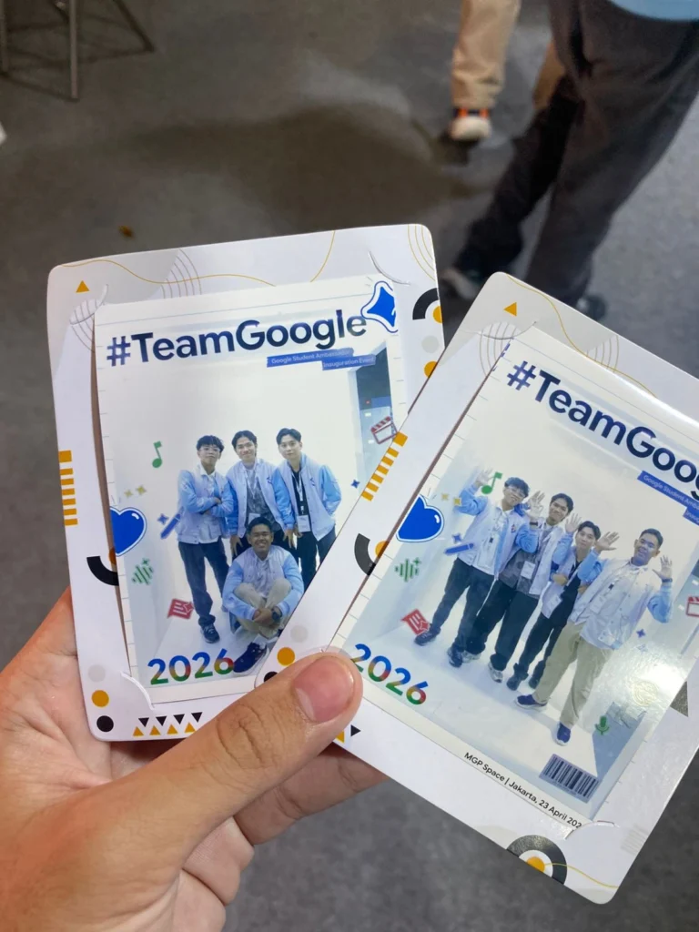 Avicena and his male colleagues striking the signature 'Aku Suges' pose with confident expressions during the Google Student Ambassador event.